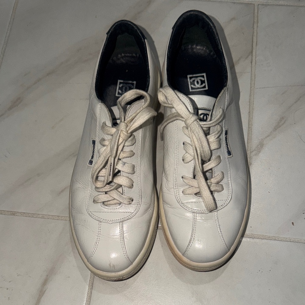 CHANEL White and Black Lace-Up Sneakers